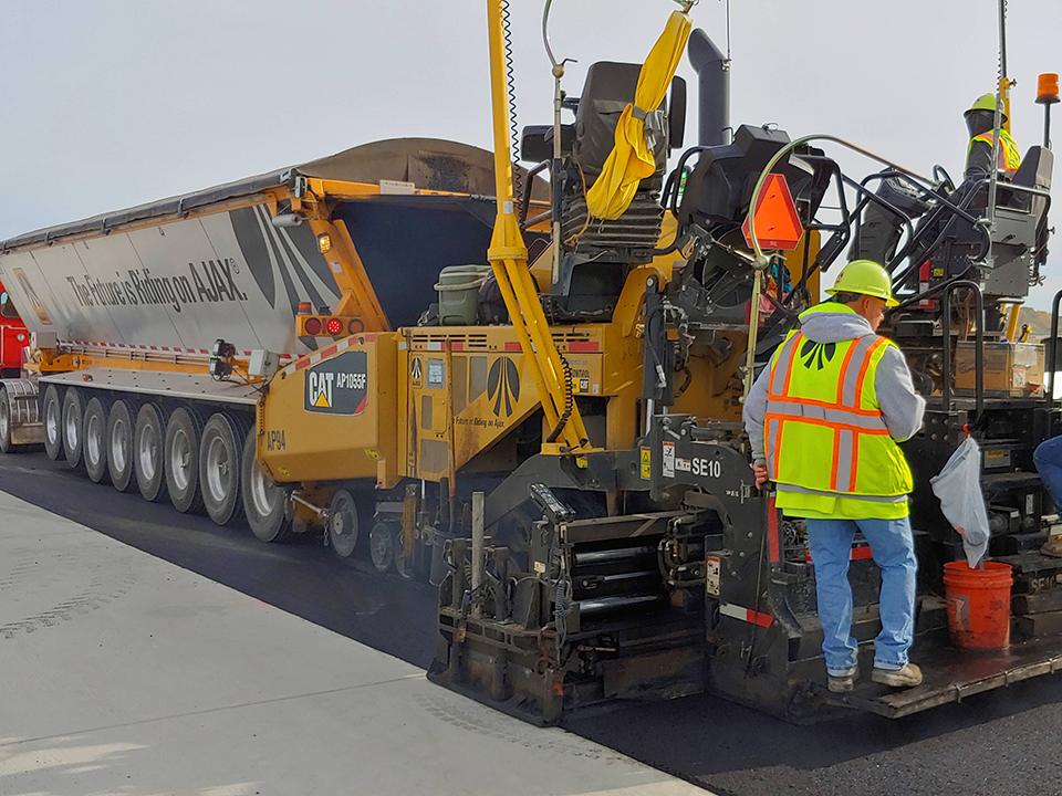Paving control solutions example for Sitech Louisiana with a paving matching on a construction site.