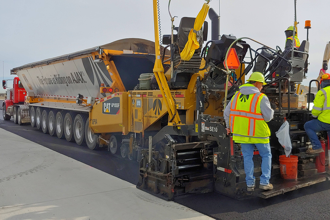 Paving control solutions example for Sitech Louisiana with a paving matching on a construction site.